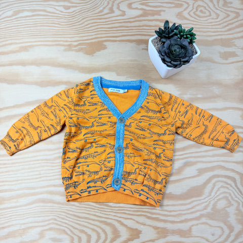 oranje gilet met krokodillen P'tit Filou maat 9m