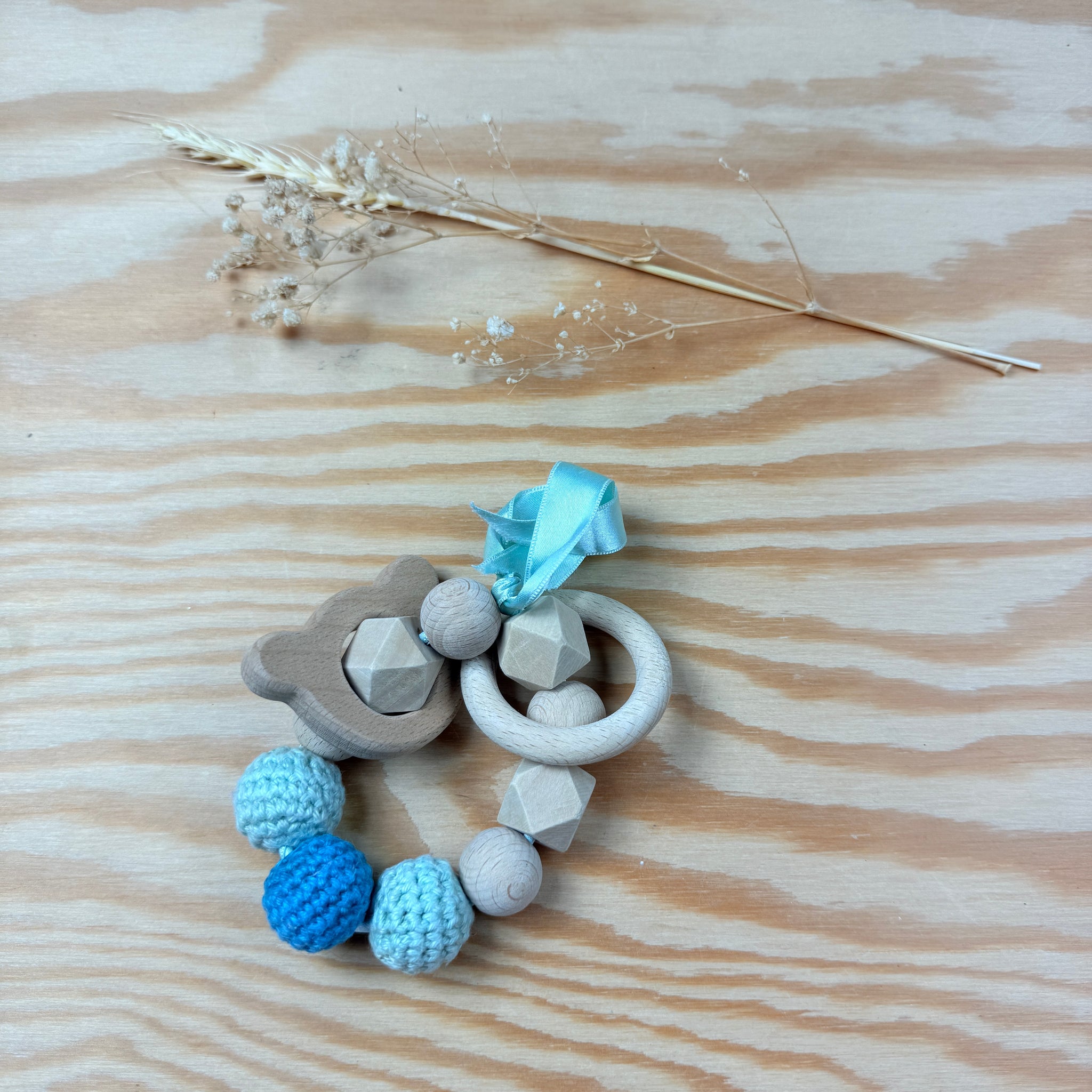 bijtring/speeltje met kralen en beer