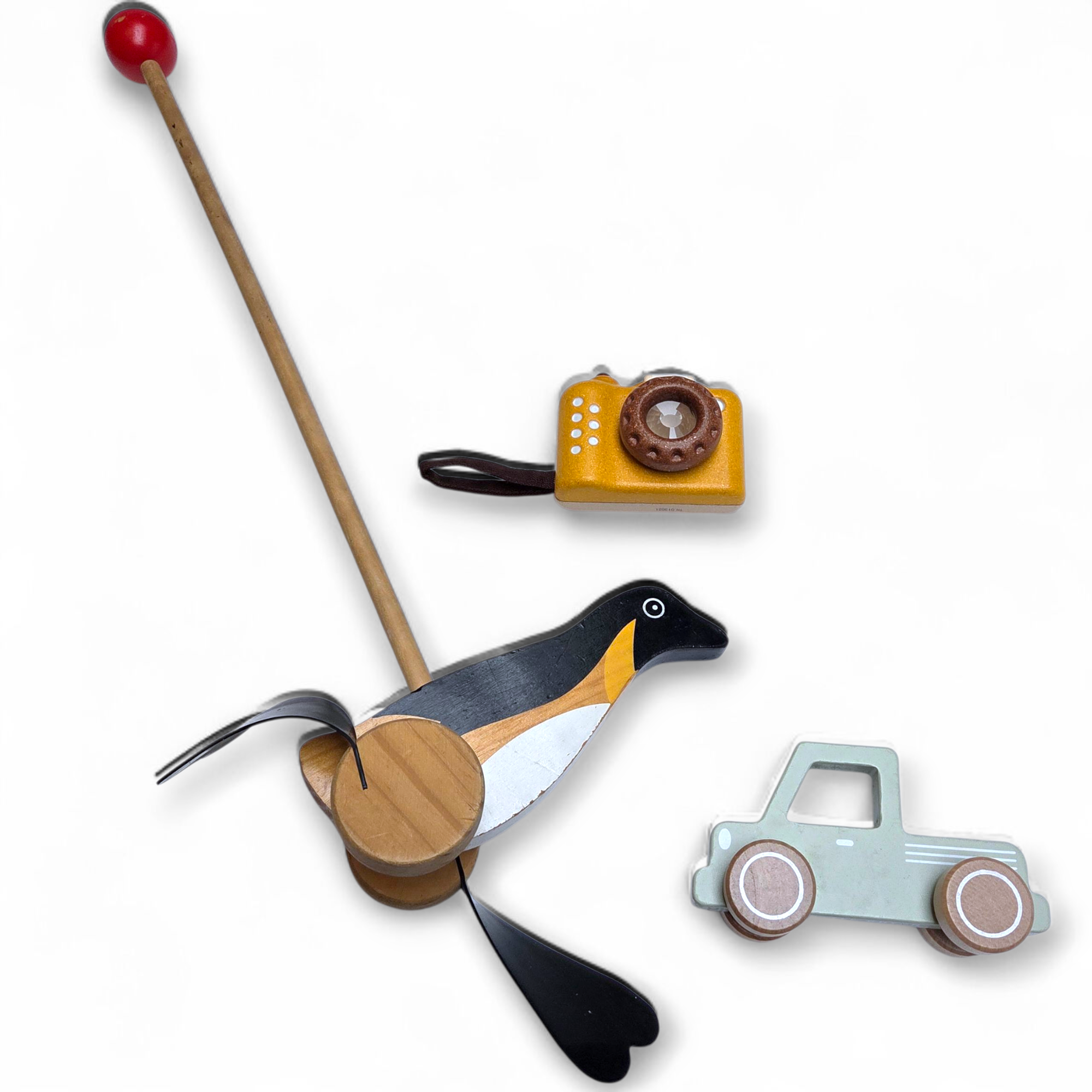 Houten set met duwstok pinguïn, auto en fototoestel