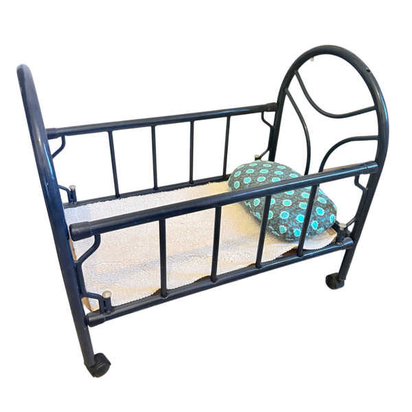 poppenbedje op wieltjes