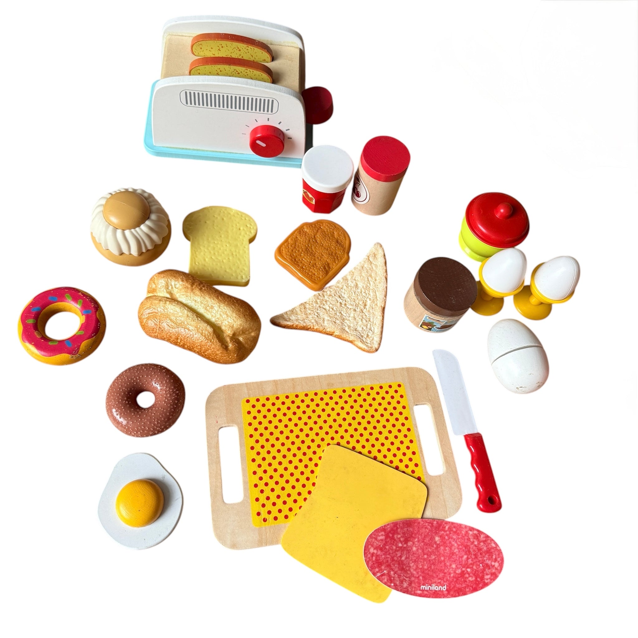 houten broodrooster met een groot ontbijt-speelset
